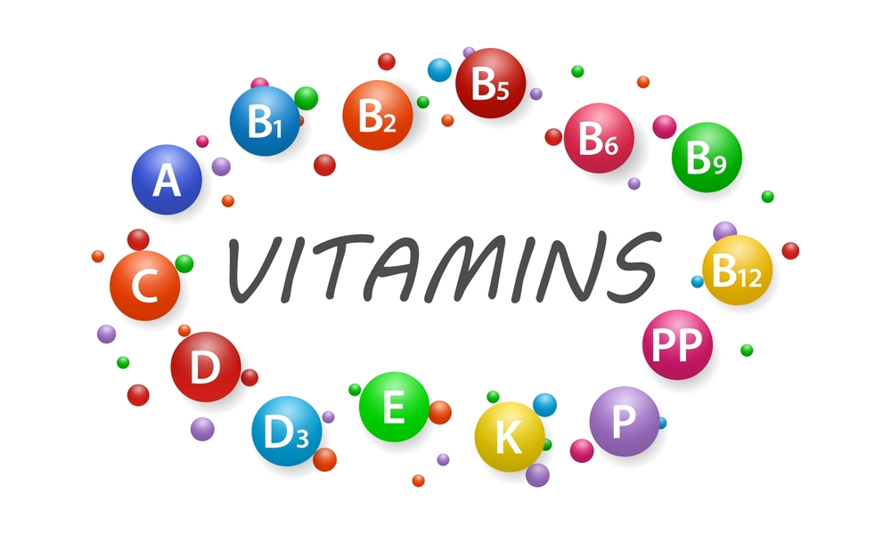 Colorful circular illustration of essential vitamins including A, B1, B2, B5, B6, B9, B12, C, D, D3, E, K, P, and PP, highlighting their importance in maintaining overall health.